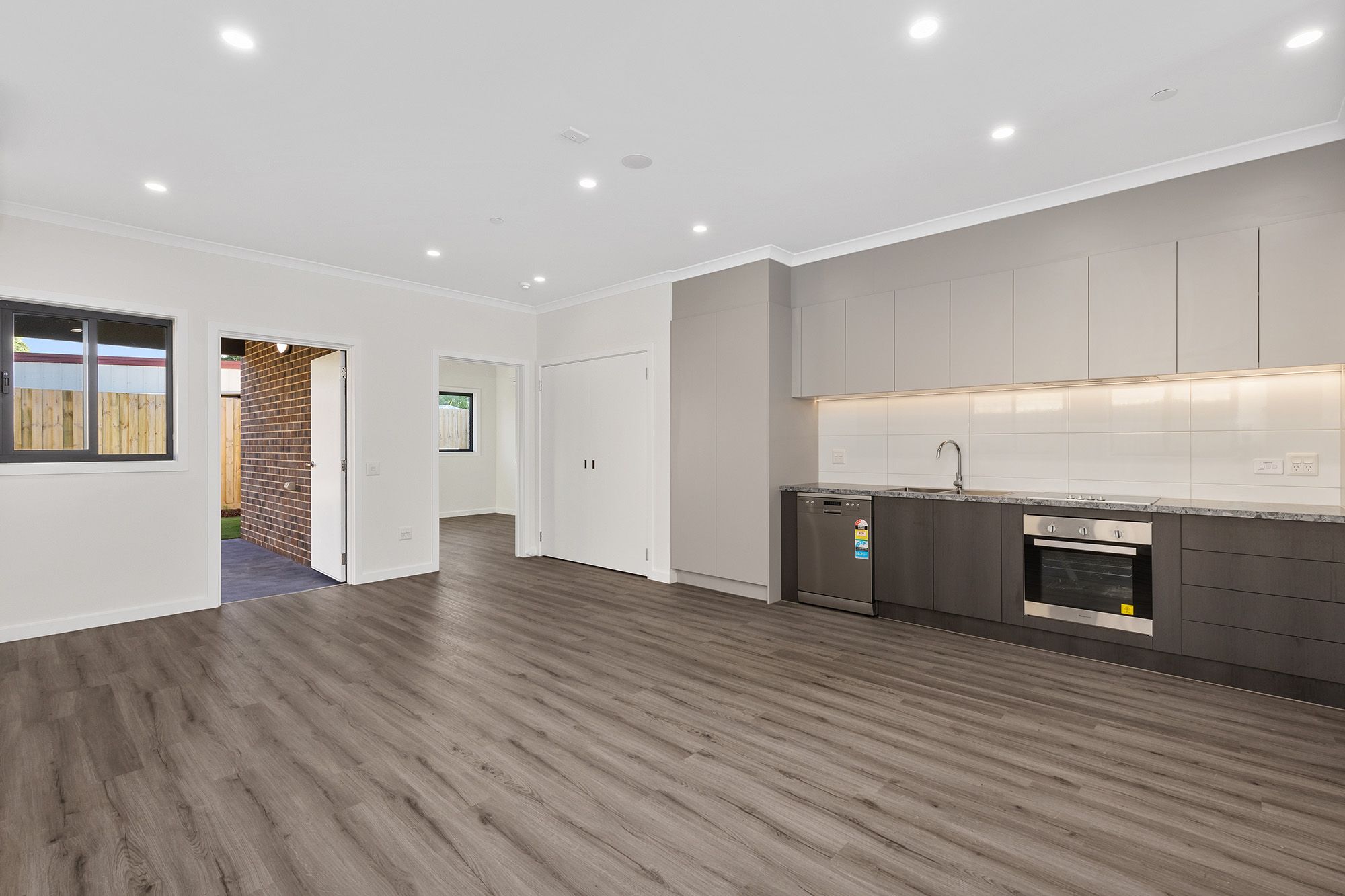 Rogers   Unit 4 Kitchen Living Dining Backyard and Bedroom 1 LR No Logo