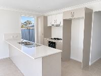 2 bradman-drive-woongarrah-32-compact-kitchen-with-island