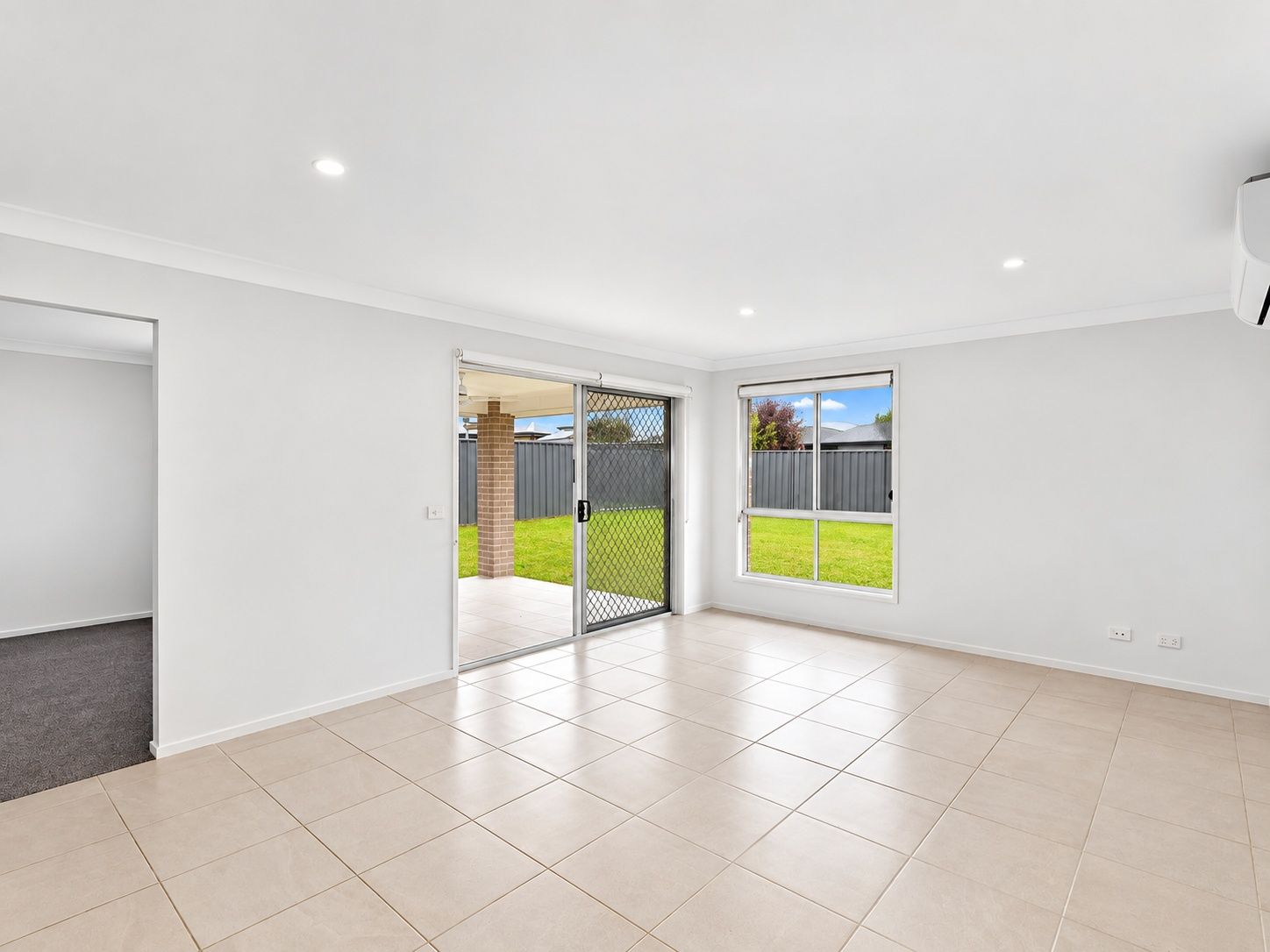 2 bradman-drive-woongarrah-08-open-plan-living-with-yard-access
