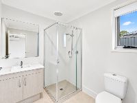 2 bradman-drive-woongarrah-05-bathroom-with-shower-vanity-and-toilet