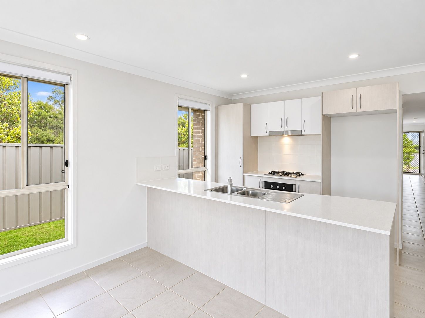 2 bradman-drive-woongarrah-07-kitchen-with-breakfast-bar