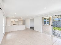 2 bradman-drive-woongarrah-10-open-plan-kitchen-living-and-alfresco-access