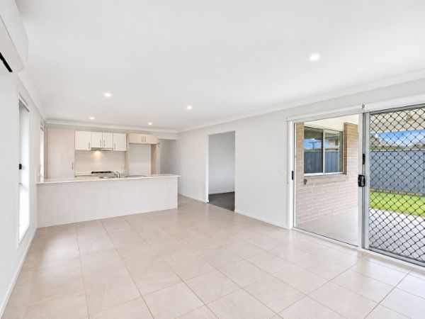 2 bradman-drive-woongarrah-10-open-plan-kitchen-living-and-alfresco-access