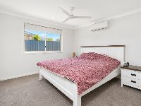 2 bradman-drive-woongarrah-18-furnished-main-bedroom