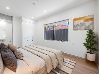 Fleet   Unit A Bedroom into Ensuite 3 LR No Logo STAGED