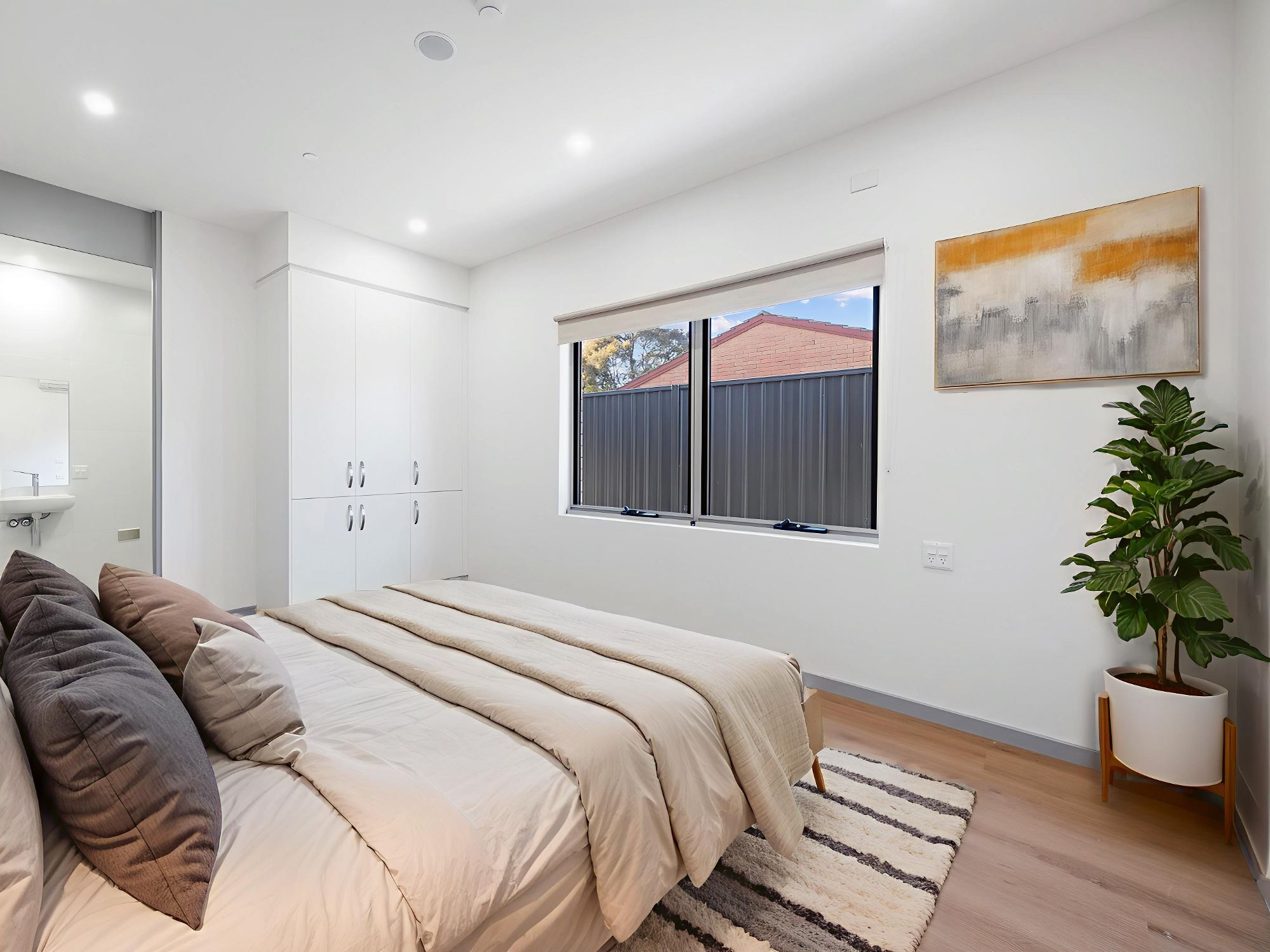 Fleet   Unit A Bedroom into Ensuite 3 LR No Logo STAGED