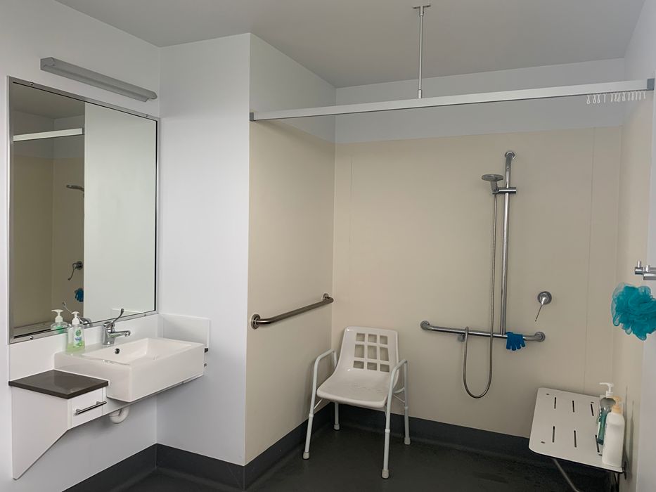 bathroom with shower for listing