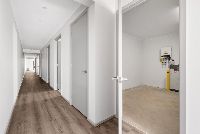 CedarTho   Hallway into Garage LR No Logo