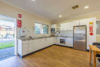 Another shot-of-the-dining-and-kitchen-area-with-less-view-of-the-dining-area