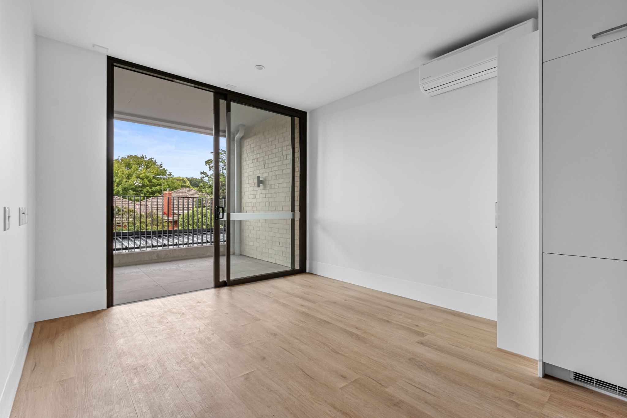 Living and baclony 2 1 Collings_Street