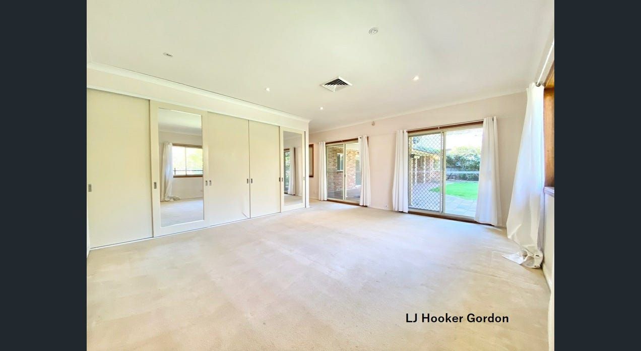 bedroom 1 with large bathroom and access to rear garden