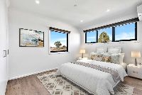 Whatley  Patrick) - Bedroom-3-Staged-LR-No-Logo