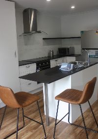 Shared spaces include kitchen, laundry and lounge area.  Currently there is one vacant room available.