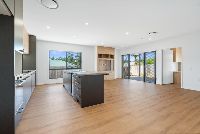 A   kitchen and living