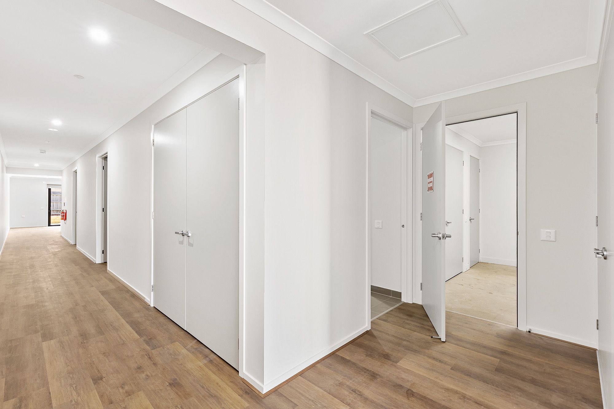 Hallway OOA Bath into Garage LR No Logo