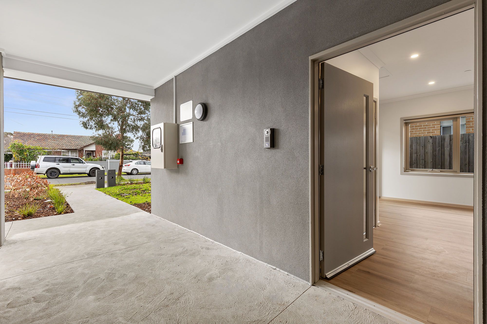 Freda   Unit 1 Porch and Entrance LR No Logo