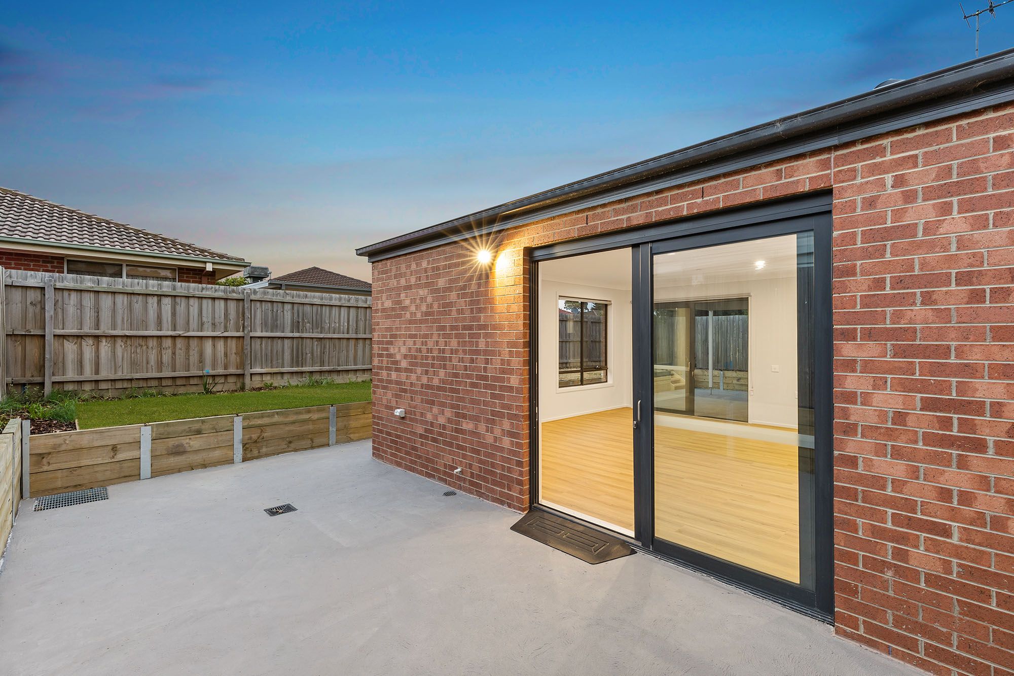 Thanos   Unit 1 Backyard 2 Dusk LR No Logo