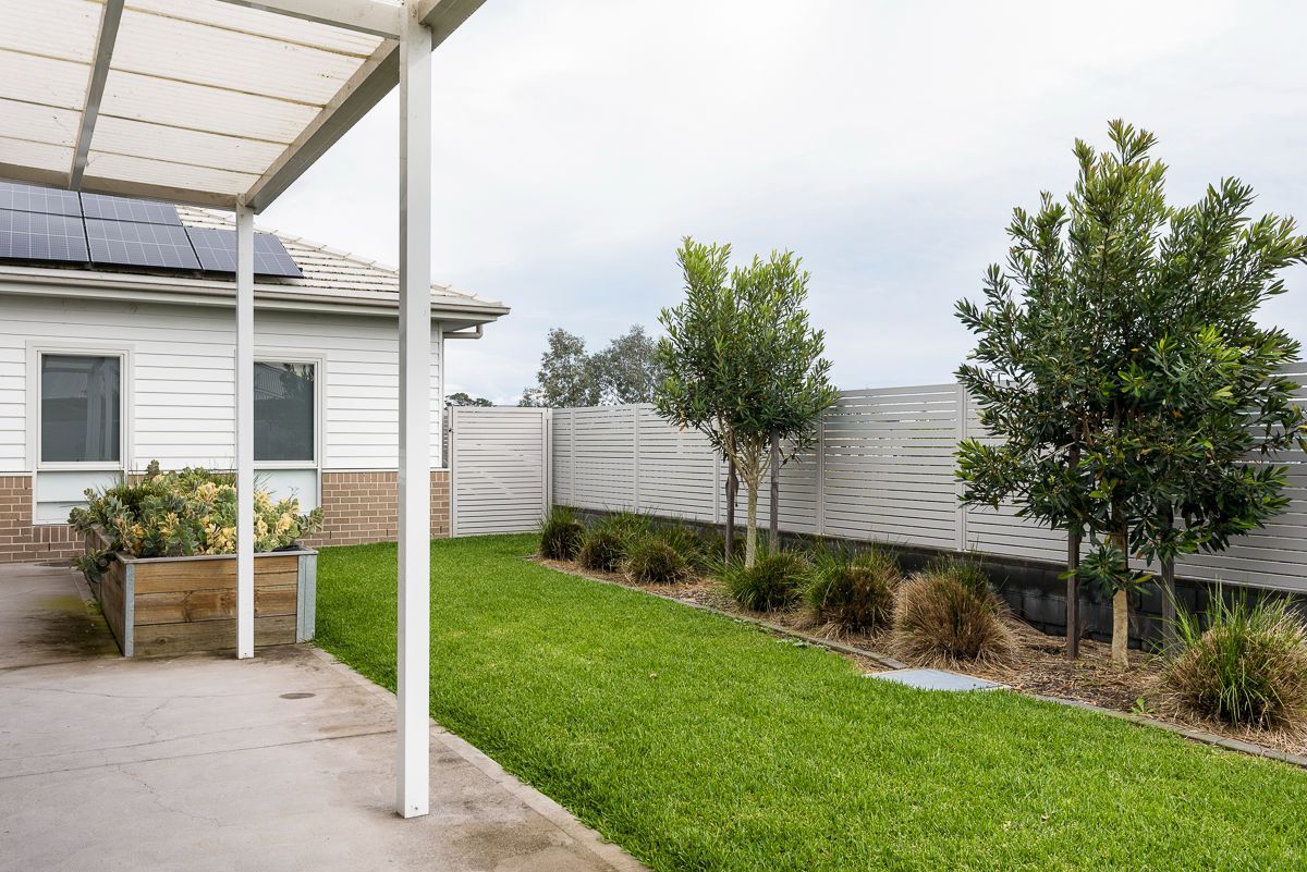 bebf389a f701-4182-b62c-caacbf2e926c-lg-SILL038-LR-fletcher-backyard