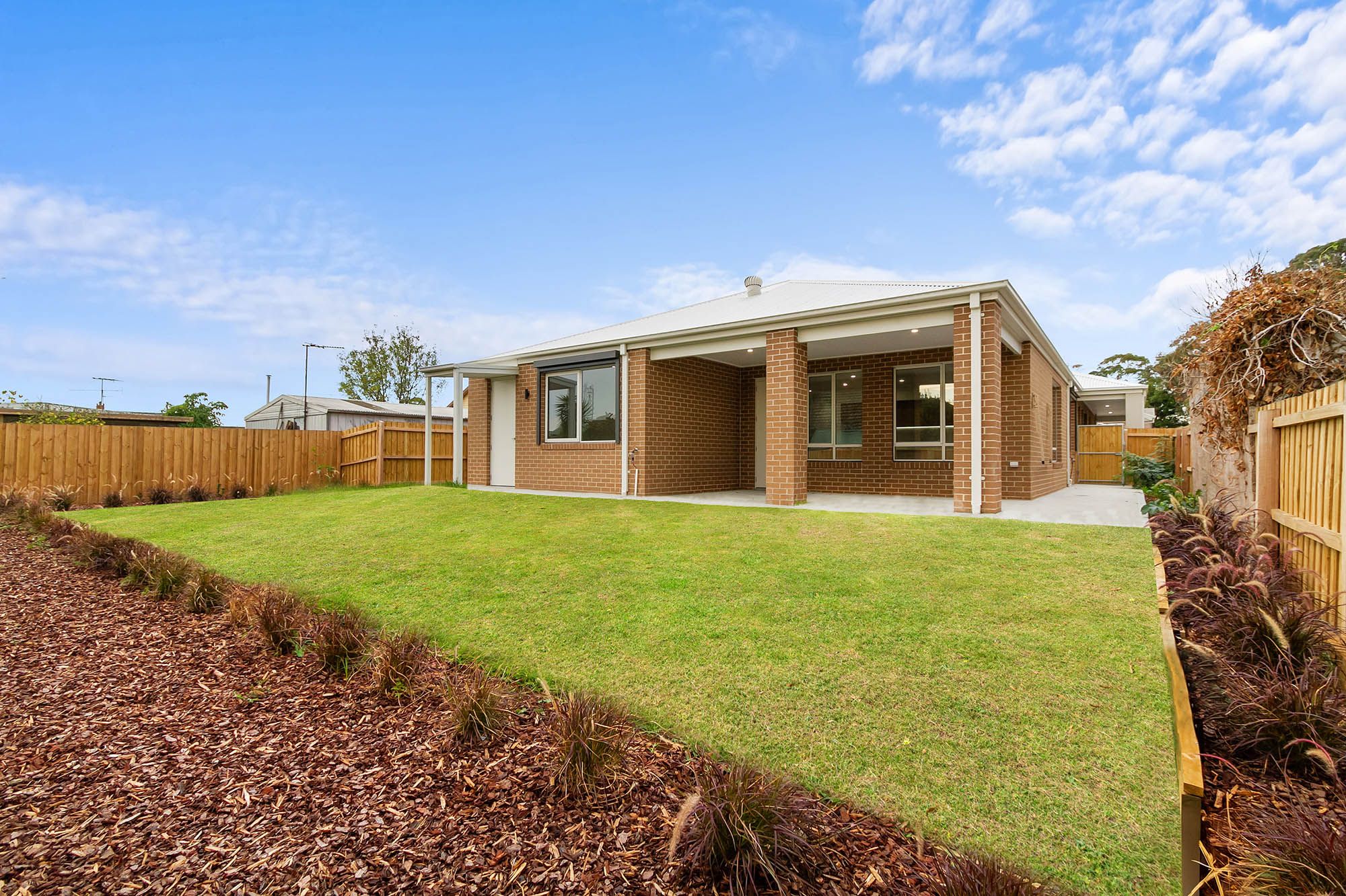 Fairfield 2 Bed Dwelling   Backyard 1 LR No Logo RETOUCHED