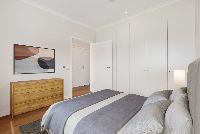 Drake   Unit 1 Bedroom 1 Staged LR No Logo