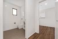 Lois   Ensuite into TV Room LR No Logo