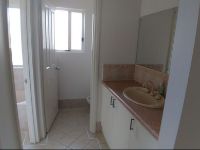 Bathroom vanity and toilet