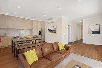 Drake   Unit 1 Kitchen Living Dining Staged LR No Logo