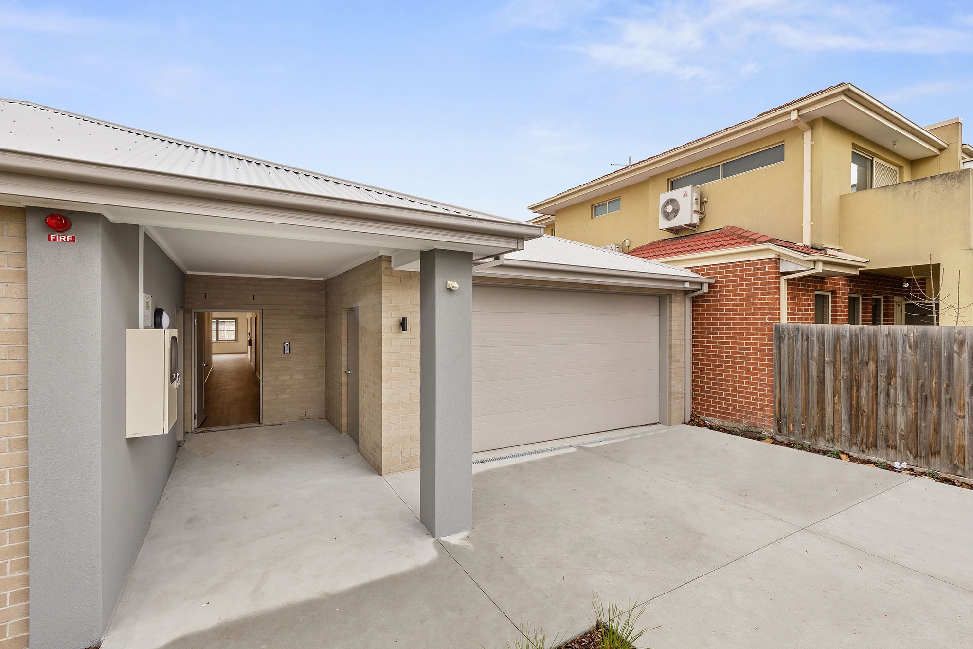 Freda   Unit 2 Entrance and Garage 1 LR No Logo