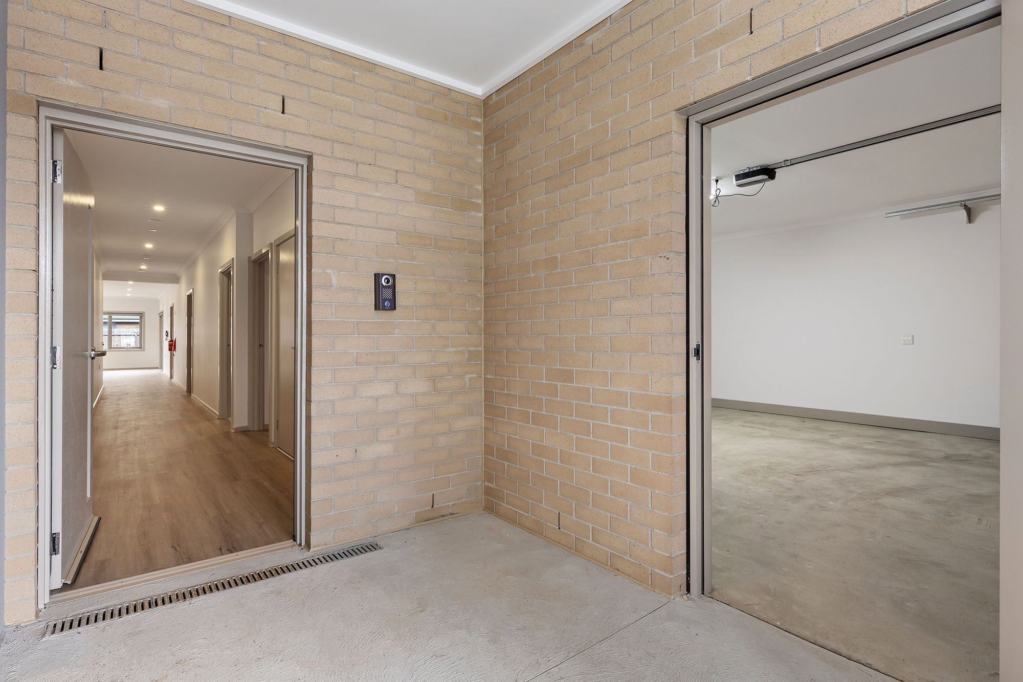 Freda   Unit 2 Entrance and Garage 3 LR No Logo