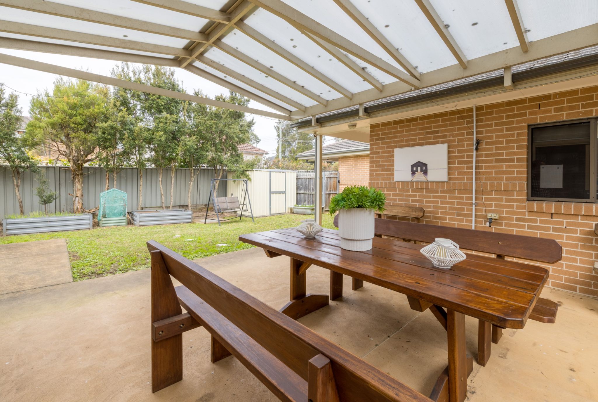 Backyard with-BBQ_-swings-and-outdoor-furniture (2)