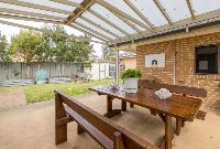 Backyard with-BBQ_-swings-and-outdoor-furniture (2)