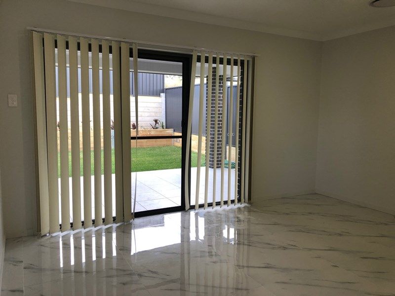 Entrance  to rear yard