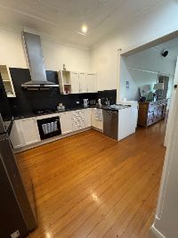Kitchen leading to lounge