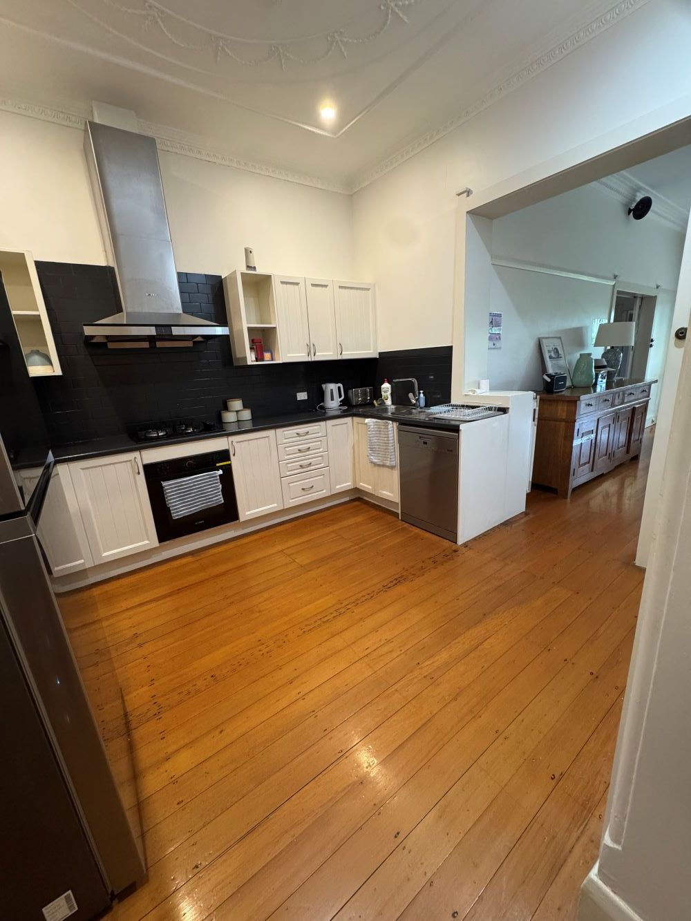 Kitchen leading to lounge