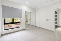 06 bedroom-two-mirrored-robe